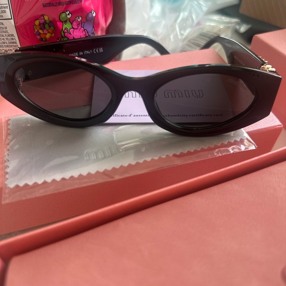 Miu Miu Dark Sunglasses - Picture 1 of 6